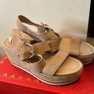 Marc Fisher size nine cream/tan wedges